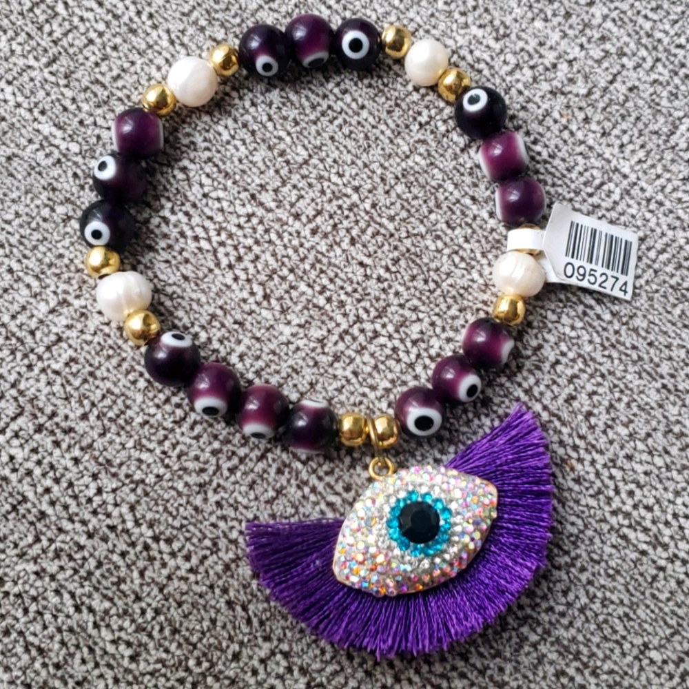 Eye braclet purple/ pulsera de ojos morada
